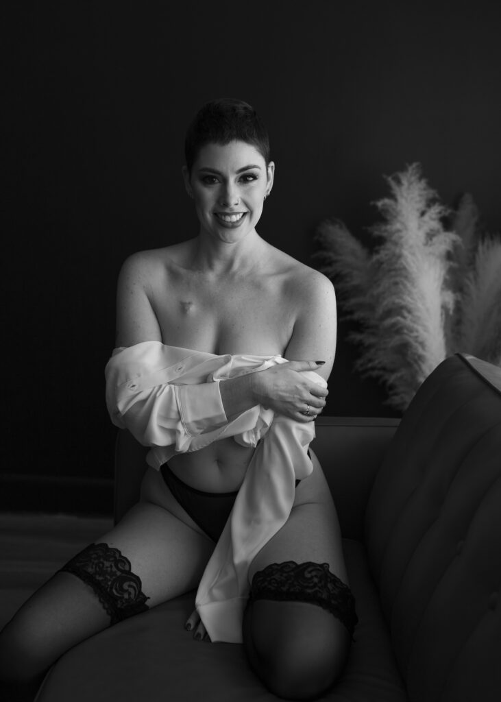 Woman poses with confidence in boudoir shoots not awkwardly in Richmond Virginia. 