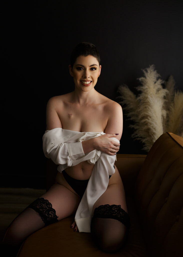 Woman poses with confidence in boudoir shoots not awkwardly in Richmond Virginia. 