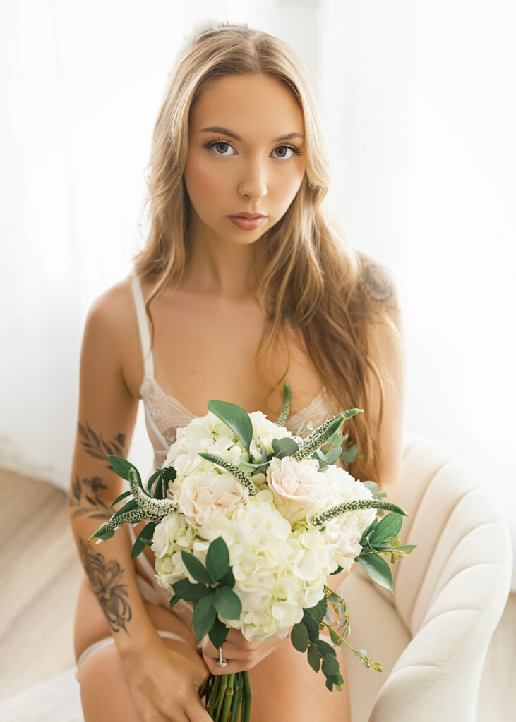 Beautiful bride posing with a bridal bouquet.
